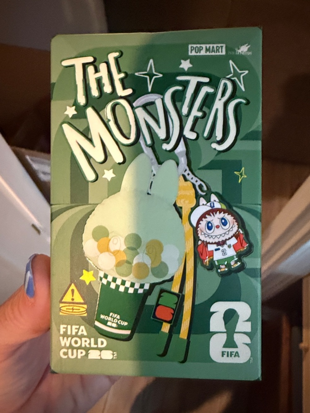 Unopened The Monsters FIFA World Cup lightup keychain